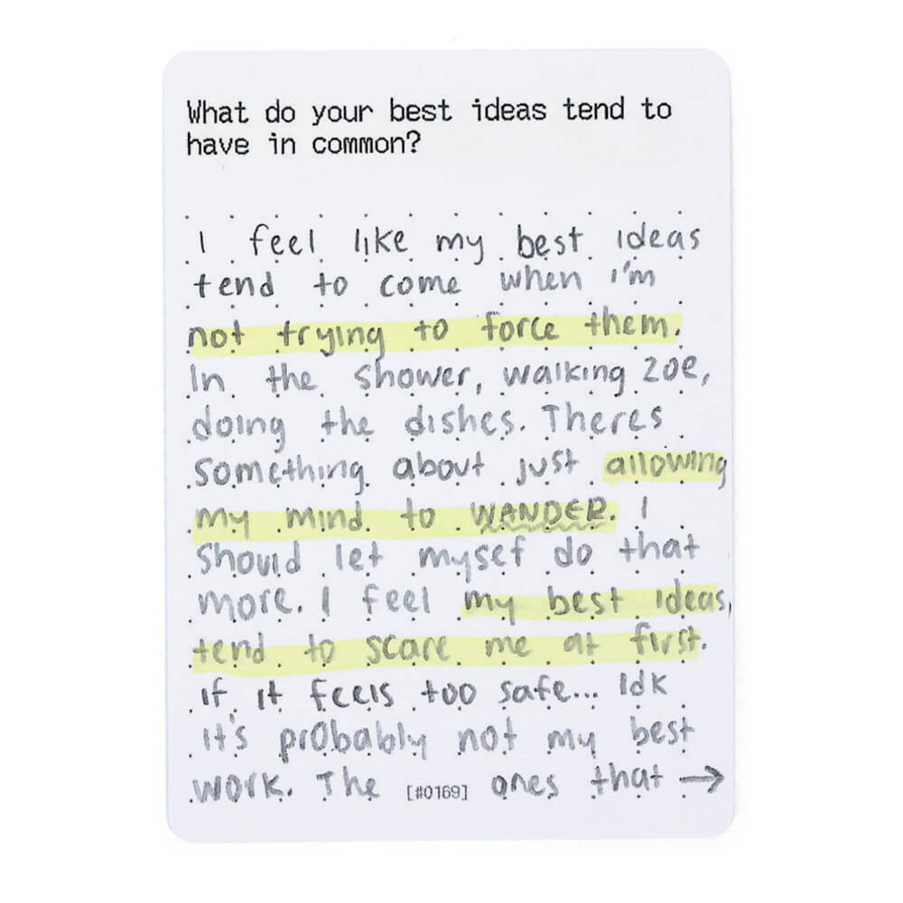 Handwritten text on a prompt card discussing ideas and where they tend to come from