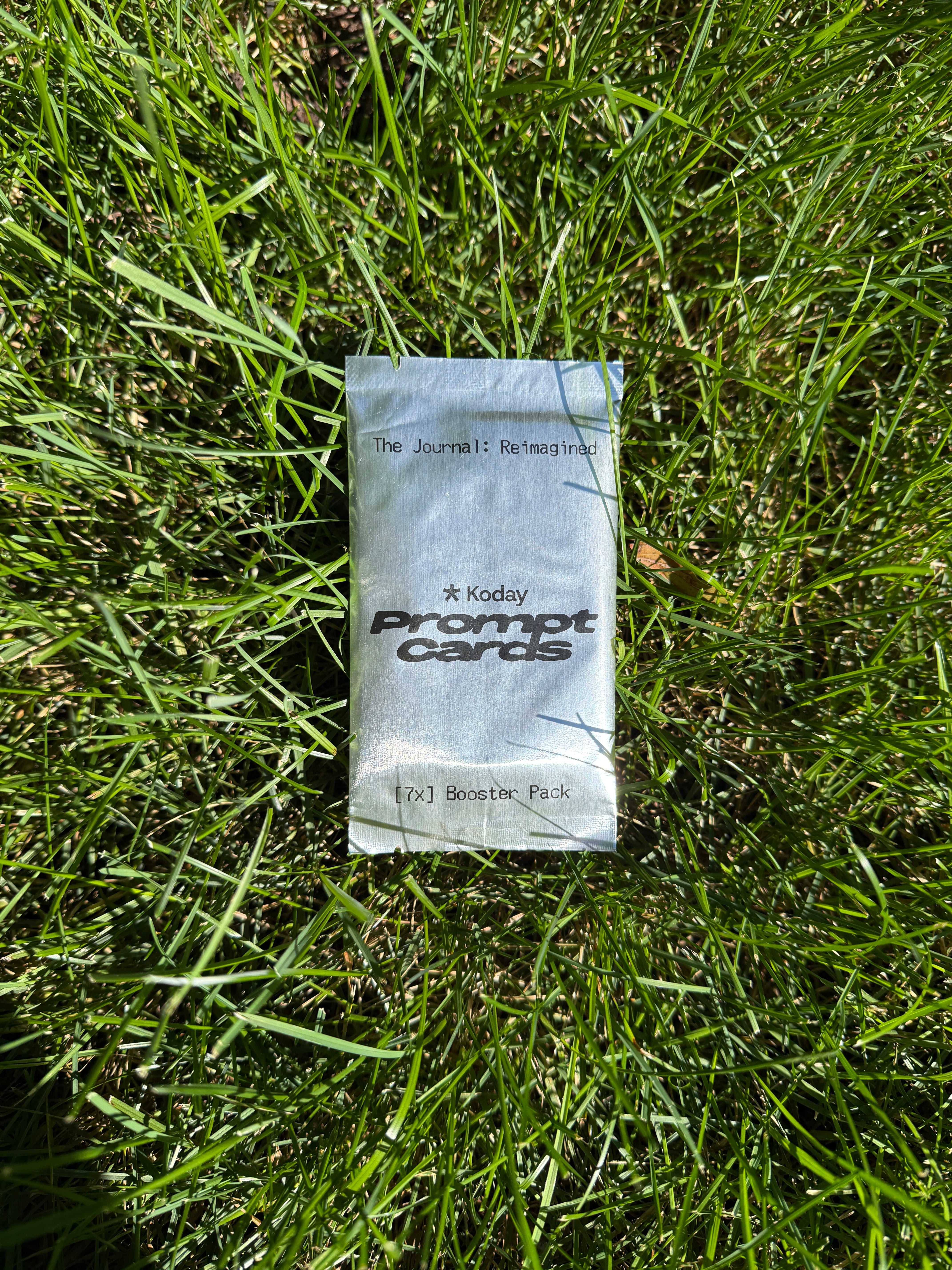 pack of Koday Prompt Cards sitting in grass